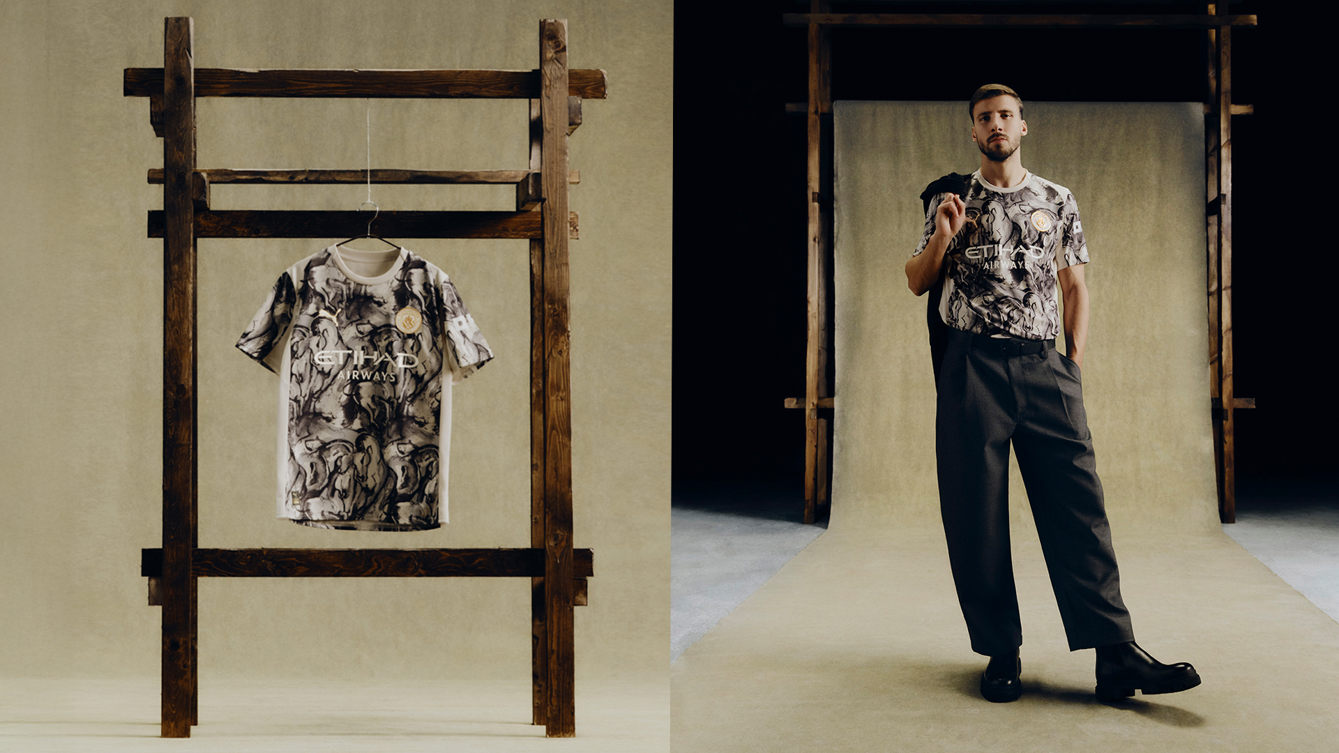 A patterned t-shirt displayed on a wooden hanger with a model holding a similar shirt in a studio setting. - Totalsports