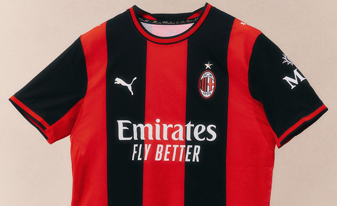 Bold red and black stripes define the AC Milan 2026/27 Home Kit by PUMA, finished with white sponsor details, crest and classic Rossonero style. - Totalsports